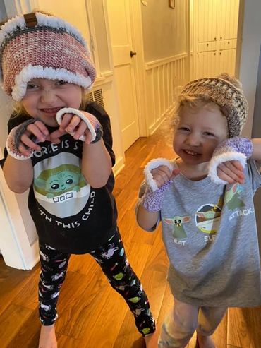 Kiddos mugging in their new cowl and fingerless mittens!