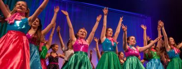 Fiona Henderson School of Dance dancers performing on stage at the Eastgate Theatre Peebles