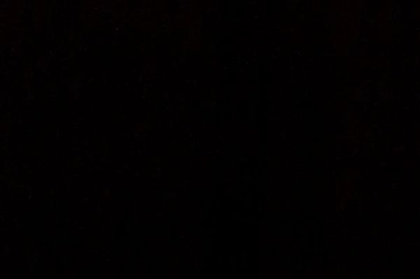 Completely dark image with no visible objects or light.