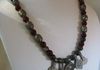 EE-142 Moroccan Muezzin:  Five Antique Silver Moroccan Berber Pendants, strung with agate beads and rust-colored spacers, accented with Ethiopian Prayer Beads. $85,