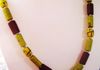 EE-282 French Cross in Yellow: Ten Yellow and Blue Glass african Trade Beads strung with old Nepal Glass Red and Yellow Beads. $85