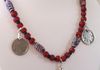 EE-283 Buffalo and Feathers: Three Indian Head Nickels strung with Venetian Feather Trade Beads, accented with Red and Blue Glass Beads. $85