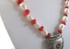 EE-399 Silver Shield: Vintage Navajo Signed Sterling Silver Watch Tip (H. Blackgoat) strung with South Sea Pearls and Red Coral. $85