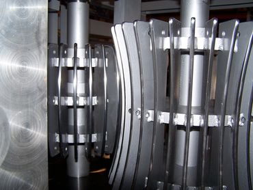 Curved steel panels in stacking rack