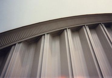 Close-up of corrugated metal roof arch