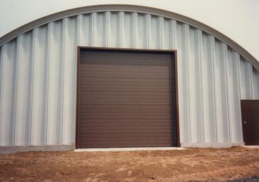 Front view of arched metal garage door
