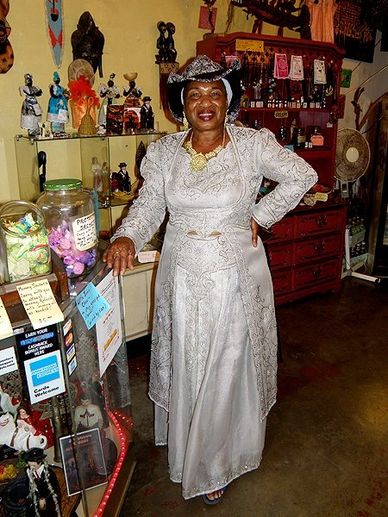 Old woman wearing princess dress with looking ahead