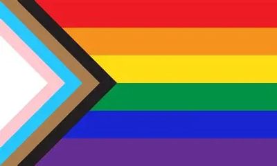 Progress Pride Flag with vibrant rainbow and additional colors for inclusivity.