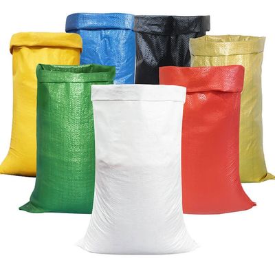 Seven colorful woven polypropylene bags arranged in two rows.