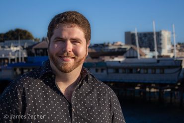 Musician Headshot. Michael Evan Moore. James Zacher