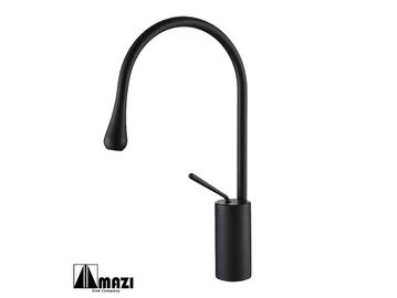 Matte black kitchen faucet with a modern curved design and single handle.