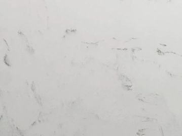 Close-up of a white marble surface with subtle gray veining.