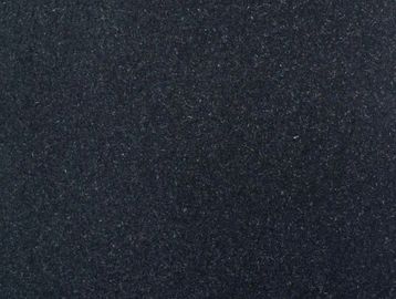 Close-up of black granite surface with speckled texture.