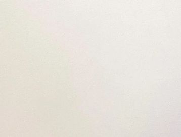 A plain off-white textured surface fills the entire frame.