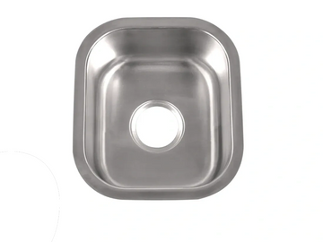 A shiny stainless steel kitchen sink basin with a central drain hole.