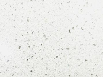 Close-up of white terrazzo surface with gray and black stone chips.