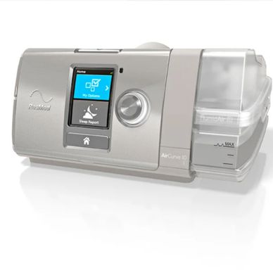 ResMed AirCurve 10 CPAP machine with digital display and humidifier chamber.