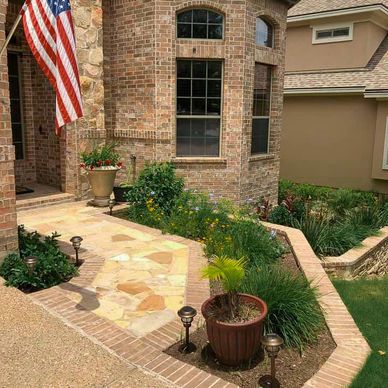 Flowerbed with Flagstone Walkway.