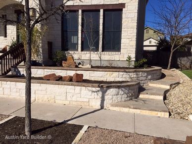 White Limestone Flowerbed and a Stone Walkway.