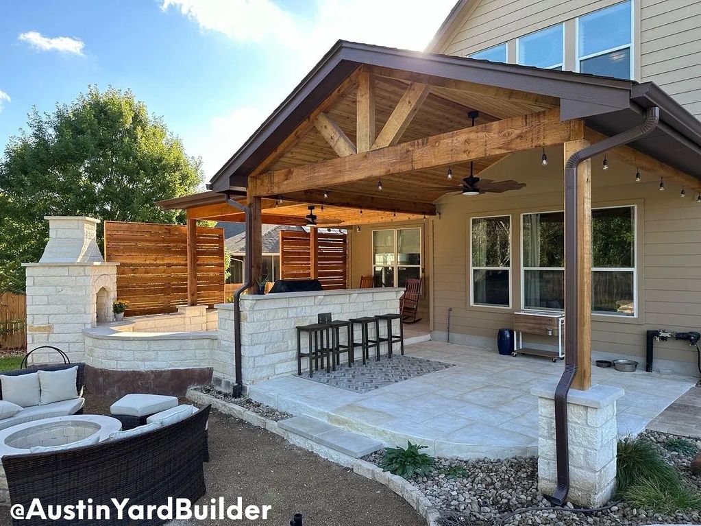 Cedar Wood Patio Cover with an Outdoor Kitchen and Fireplace Round Rock project