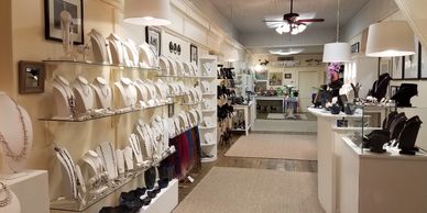 Interior photo of showroom jewelry displays in Secret Garden Gallery & Boutique in Washington NC.