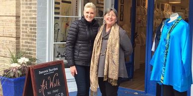 Barbara Hardy and Small Business Revolution star Amanda Brinkman in front of Secret Garden in 2019.