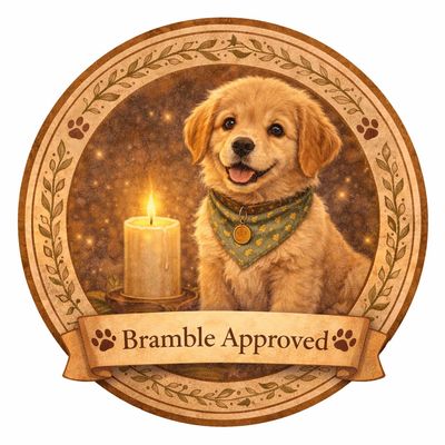 A happy golden retriever puppy with a candle and 'Bramble Approved' banner.