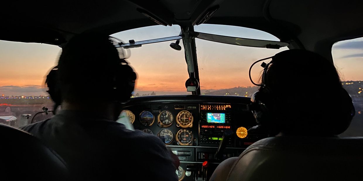 The owner and his then girlfriend now wife on a sunset flight. 
