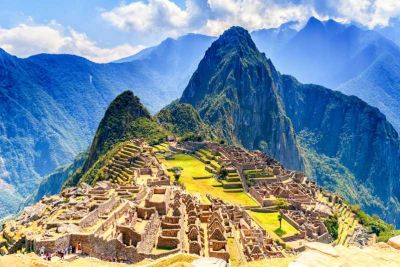 Machu Picchu ancient city in Peru with mountain backdrop.