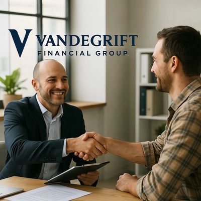 Business handshake between two men at Vandegrift Financial Group office.