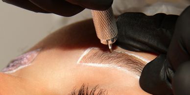 Professionally microbladed eyebrows are prominently featured.