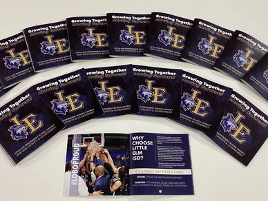 Custom printed school booklets for Little Elm ISD, showcasing professional commercial printing by AL