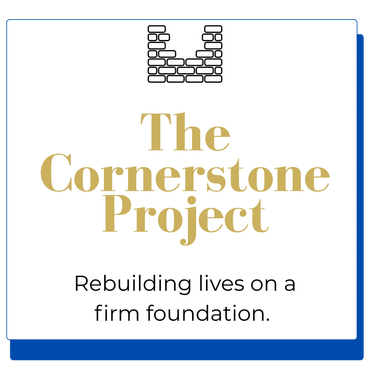 Logo for The Cornerstone Project with a brick wall icon and tagline.