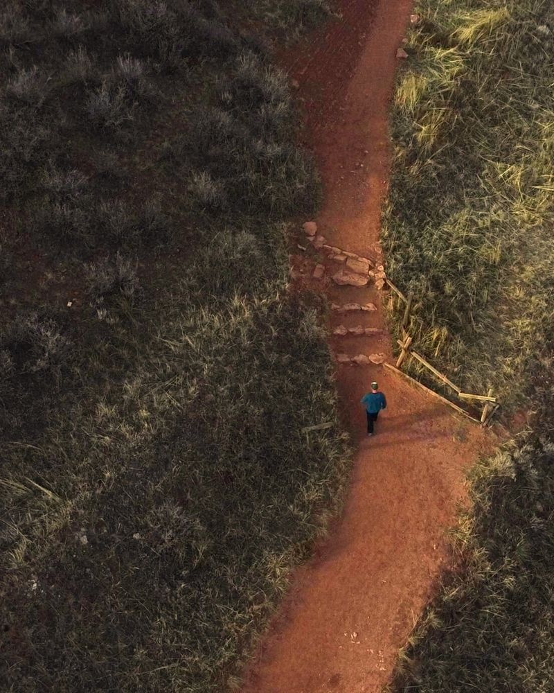 Man walking a dirt road