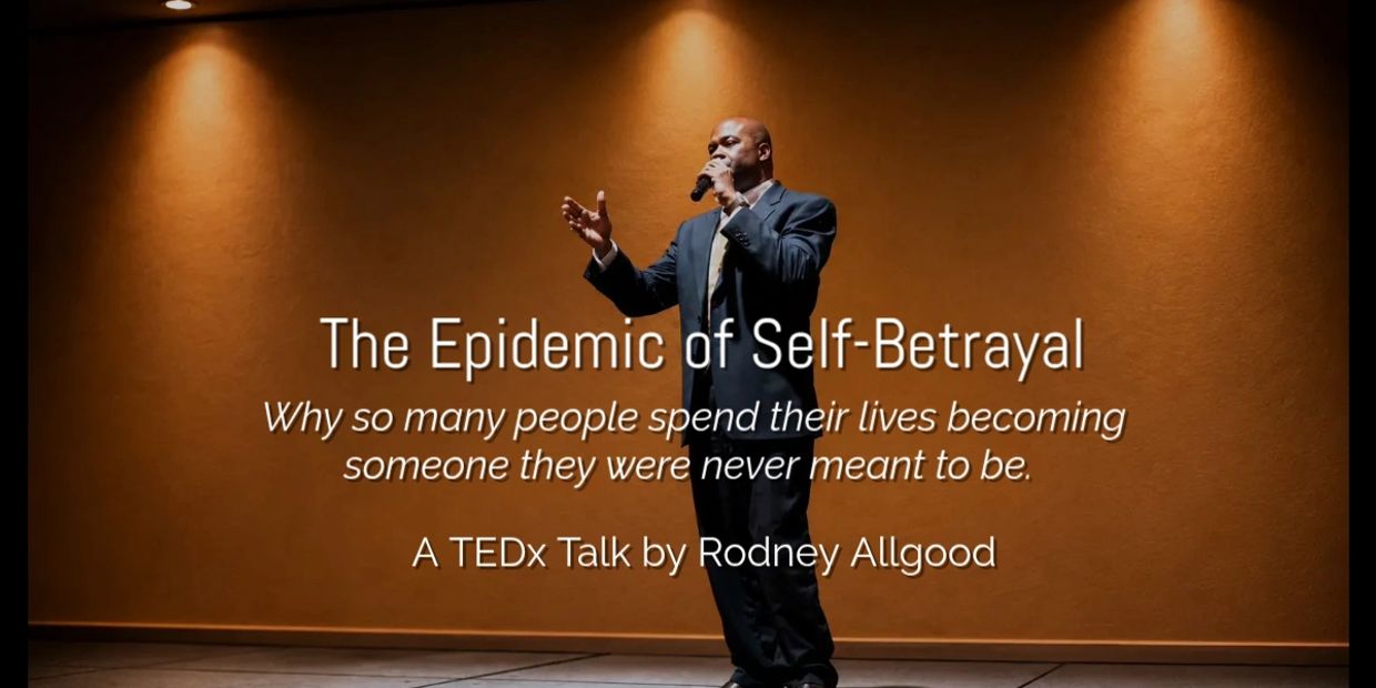 Man giving a TEDx talk on self-betrayal.