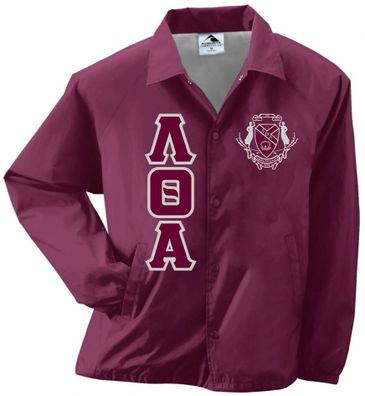Maroon jacket with Lambda Theta Alpha letters and crest emblem.