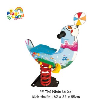Colorful spring rider shaped like a playful seal with a ball on its nose.