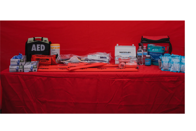 Collection of EMS supplies on table