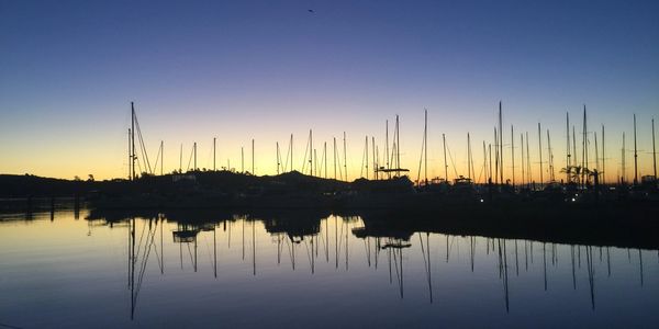 boats docked at a marina on San Francisco Bay at sunset