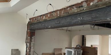 A structural steel beam being installed by Alphabuild in Northumberland