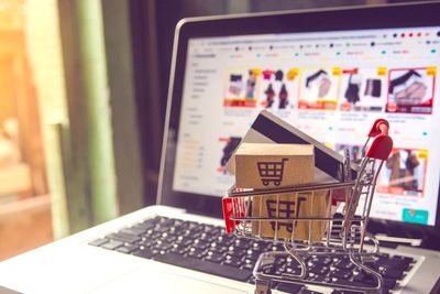 Computer showing website of products for sale being purchased and shipped direct to consumer.
