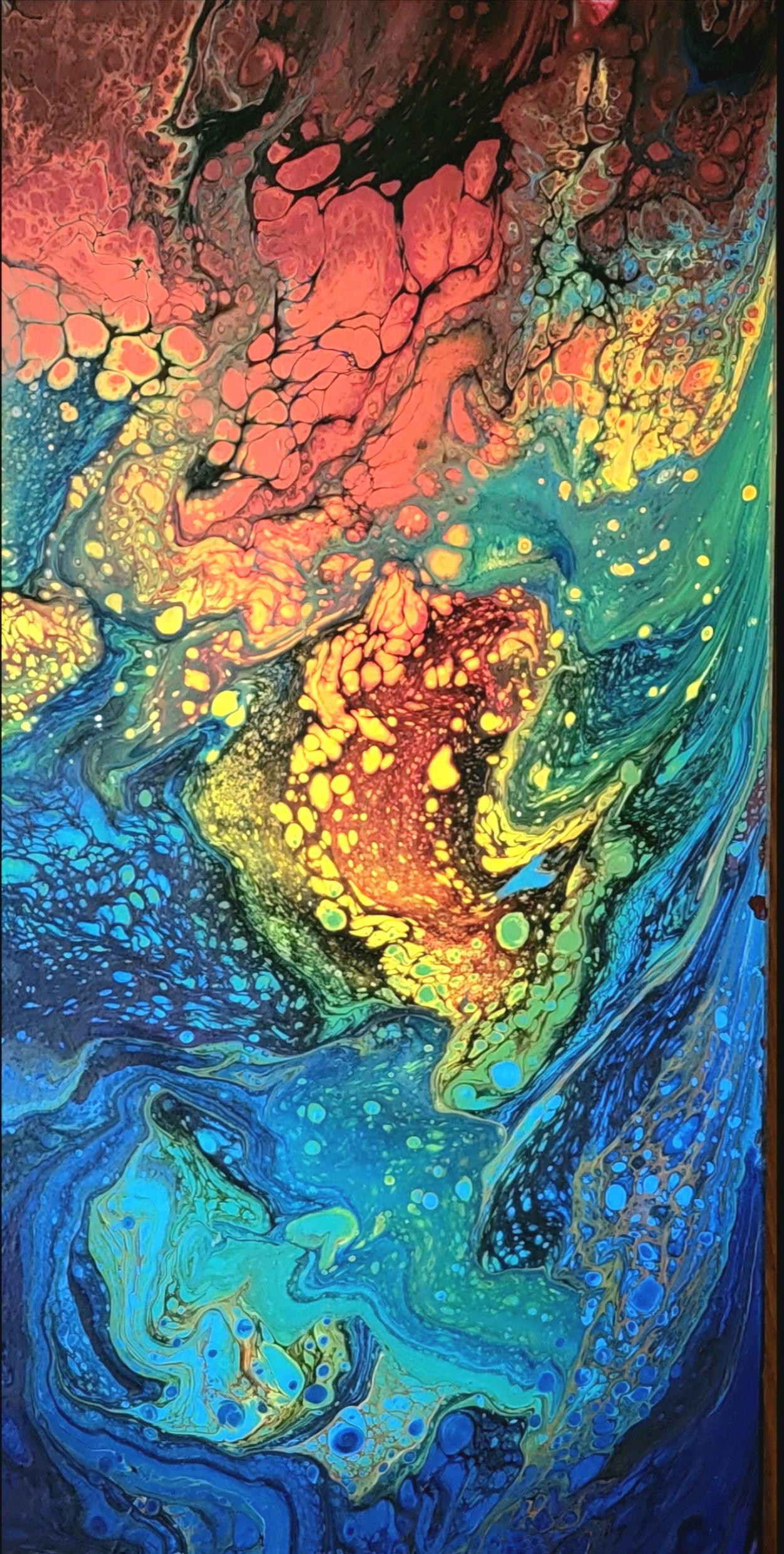 Abstract fluid art with vibrant colors and cell patterns.