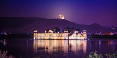 Illuminated Jal Mahal in Jaipur on a Full Moon Night 