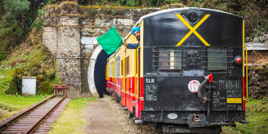 The Kalka-Shimla toy train entering a tunnel