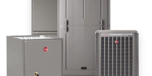 A set of Rheem HVAC units including furnace, air handler, and outdoor condenser.