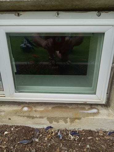 This is a basement window that we restored, it was completely covered in calcium & hard water stains