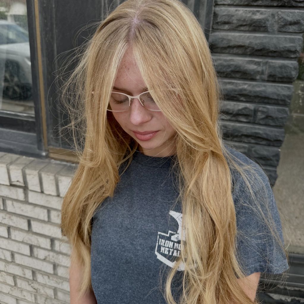 Balayage, Layered Cut & Bangs — sun-kissed color, effortless movement, face-framing finish.