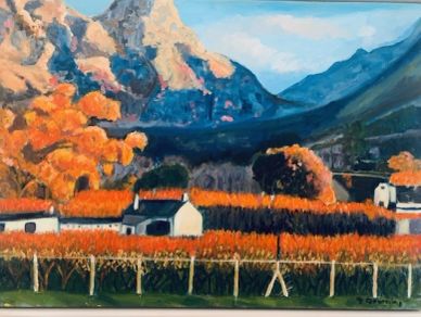 Autumn village with mountains background.