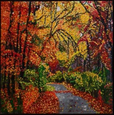A vibrant autumn landscape with colorful foliage and a winding path.