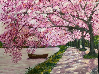 Cherry blossoms over a lakeside path with a boat.